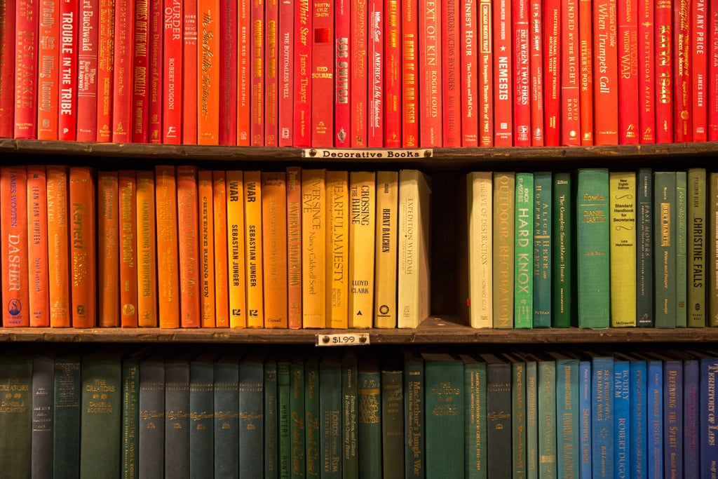 You can appreciate a colour-coded book collection.