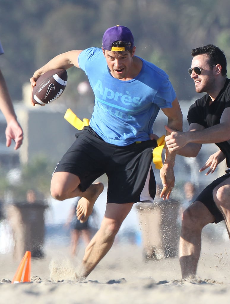 On Saturday, Josh Duhamel gave it his all while playing football with buddies at the beach in LA.