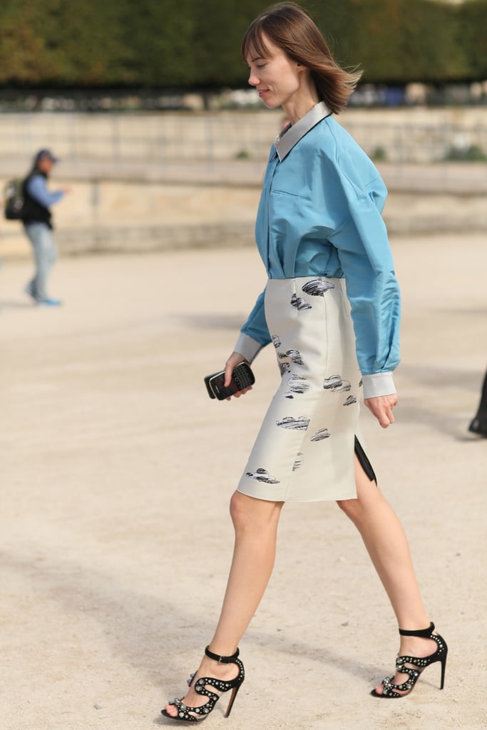 Whimsical footwear and a playful print livened up a minimalist button-down.
Whimsical footwear and a playful print livened up a minimalist button-down.