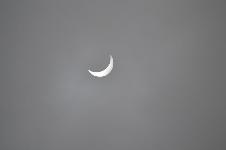 Some people were able to view the eclipse from their homes in Europe, like this shot from a Twitter user in Ghent, Belgium.