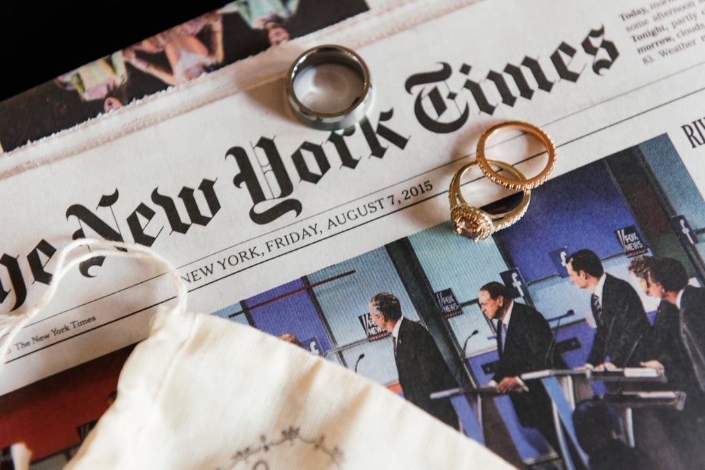 Tip: Using a newspaper to showcase your rings is a great way to remember your wedding date.
Photo by Everly Studios