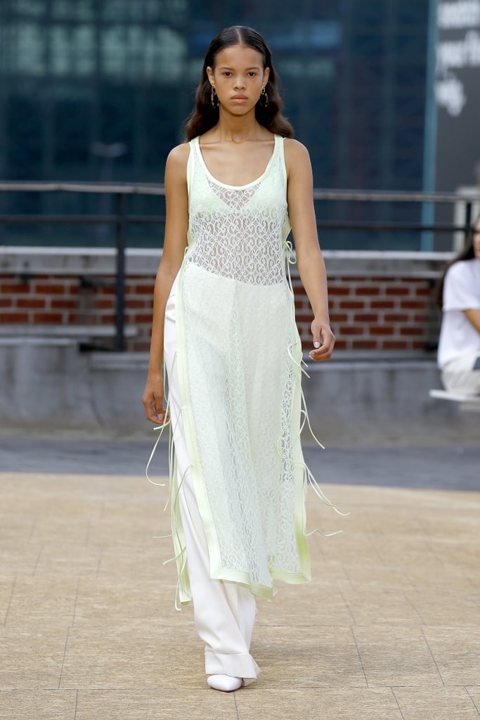 A Green Dress Over Pants on the Jonathan Simkhai Runway During New York Fashion Week