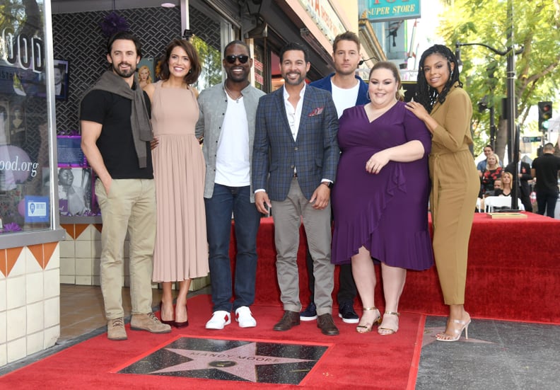 HOLLYWOOD, CALIFORNIA - MARCH 25: (L-R) Milo Ventimiglia, Mandy Moore, Sterling K. Brown, Jon Huertas, Justin Hartley, Chrissy Metz, and Susan Kelechi Watson attend a ceremony honoring Mandy Moore with a star on the Hollywood Walk Of Fame on March 25, 201