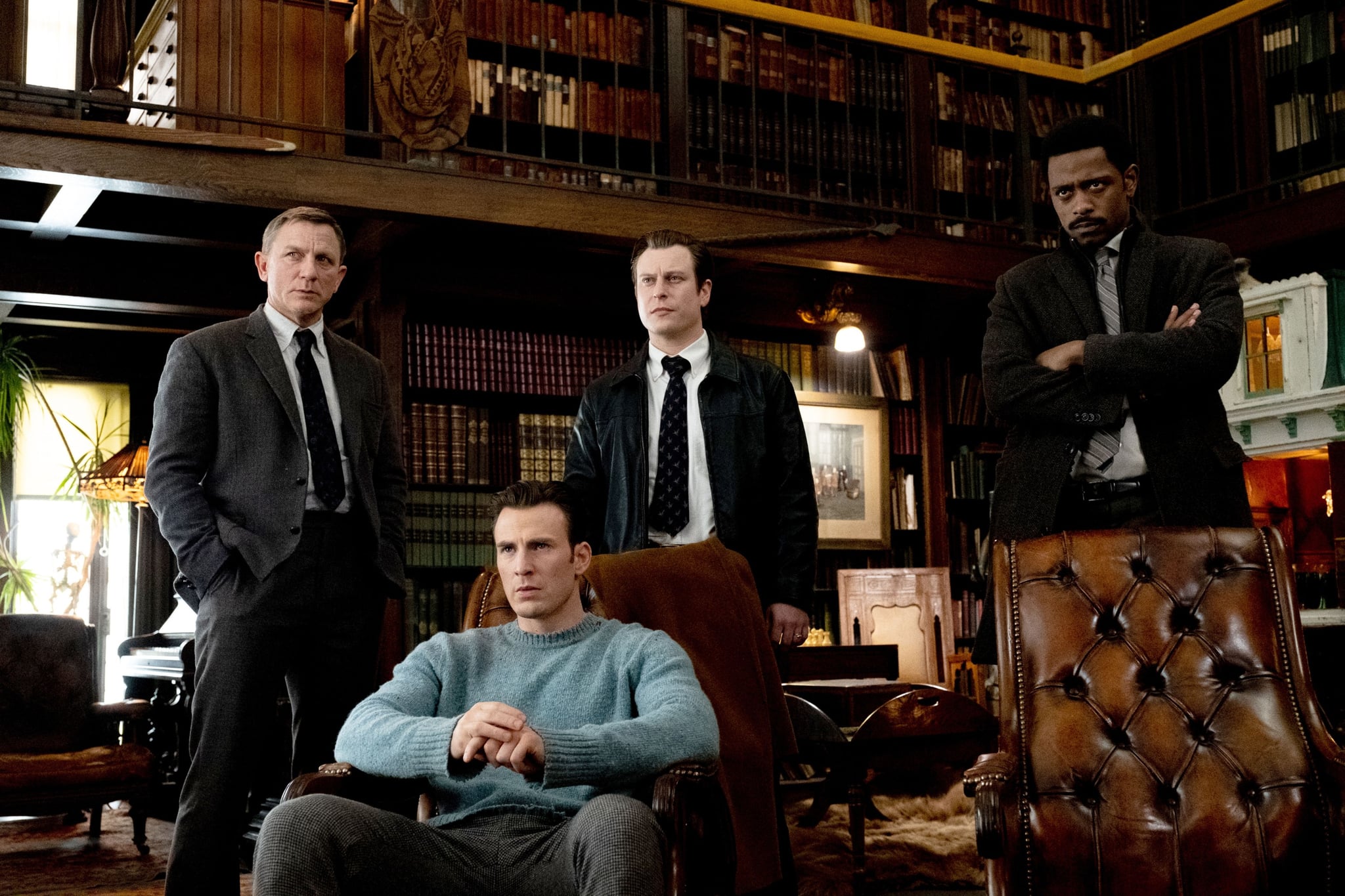 KNIVES OUT, standing from left: Daniel Craig, Noah Segan, LaKeith Stanfield; seated: Chris Evans, 2019. ph: Claire Folger /  Lionsgate / courtesy Everett Collection