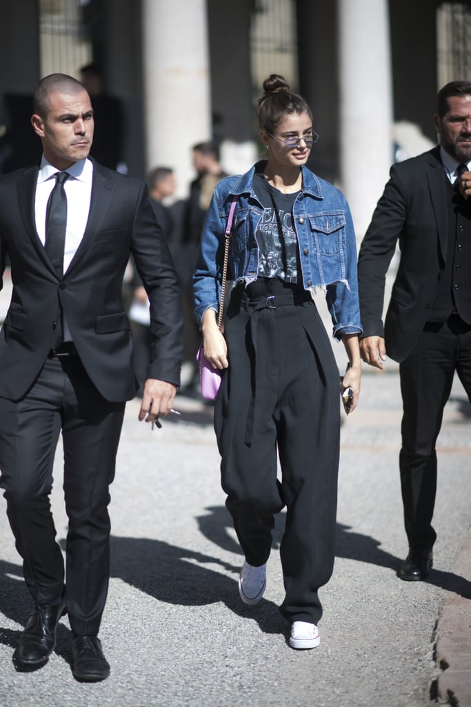 Taylor Hill Was Seen During MFW Wearing a Cropped Denim Jacket and Belted Trousers