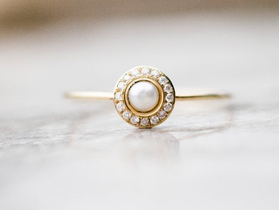 white pearl ring with diamonds
