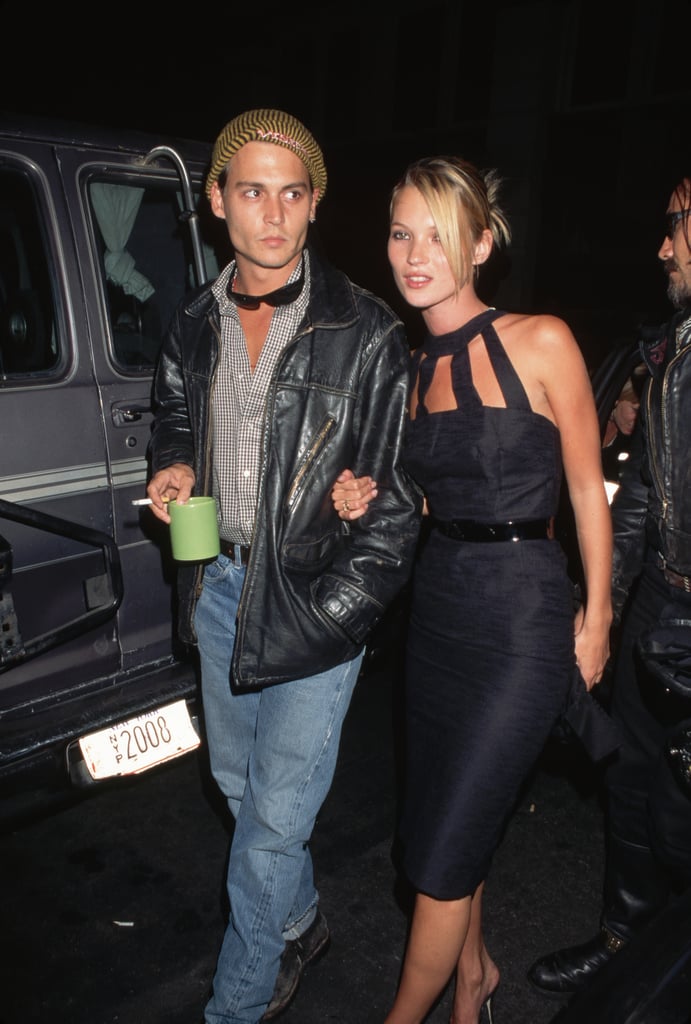 With Johnny Depp in 1995, wearing a halter dress with cutouts at the neck.