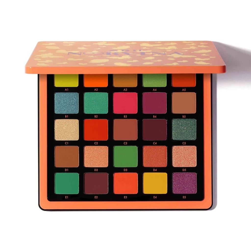 Using an eye primer, I shaped exactly how and where I wanted the placement of the orange shadow. Then I filled it in with eyeshadow from the Anastasia Beverly Hills Pro Pigment Palette Vol. 3 ( $60).