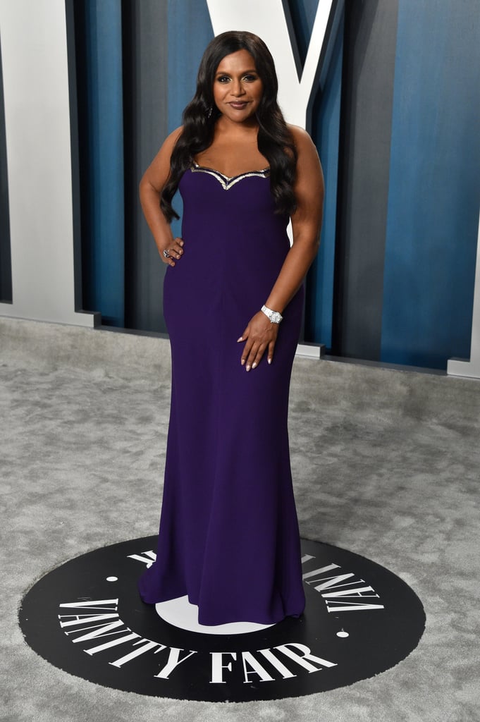 Kaling proved deep purple is her color in this Reem Acra sheath dress at the Vanity Fair Oscars party in 2020, finishing the ensemble with a diamond timepiece to draw attention to her bead-embellished neckline.