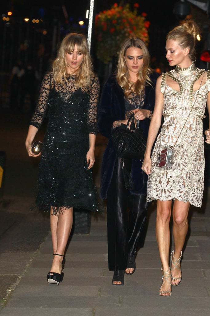Suki met up with friends Cara Delevingne and Poppy Delevingne outside the reception.