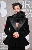 Harry Styles Brings the Peplum Back in Velvet Suit at the 2023 Brits