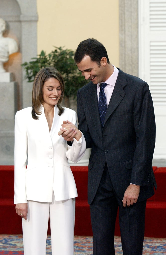 The couple smiled from ear to ear while showing off Letizia's engagement ring during their official engagement announcement in November 2003.