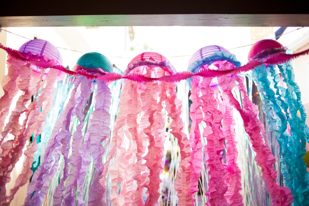 "Hand crafted blowfish and jellyfish of various colors added to the playful marine vibe."