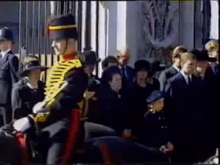 The queen's gesture is remarkable for a couple of reasons; first, while it is customary for others to bow (or curtsy) to her majesty, she is not technically required to bow or curtsy to others. She made a solemn, unexpected acknowledgment to her former daughter-in-law's casket that she rarely does for anyone else.
Second, there was a huge amount of drama within the royal family after Diana's death, including the fact that Queen Elizabeth II had insisted that Diana's ceremony be private — she faced "fierce resistance" from Prince Charles, and then-British Prime Minister Tony Blair also agreed that Diana should be laid out at St. James's Palace with a public funeral held at Westminster Abbey. Because the queen was so highly criticized for her silence and "business-as-usual" behavior in the wake of Diana's death, her bowing at the coffin attempted to send a message of compassion, honor, and genuine grief.