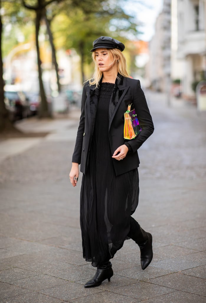 Wear leggings or tight-fitting skinny jeans that you can tuck into boots underneath the chiffon maxi you style with swimsuits in the Summer. Finish with a hat and a luxe-looking jacket.