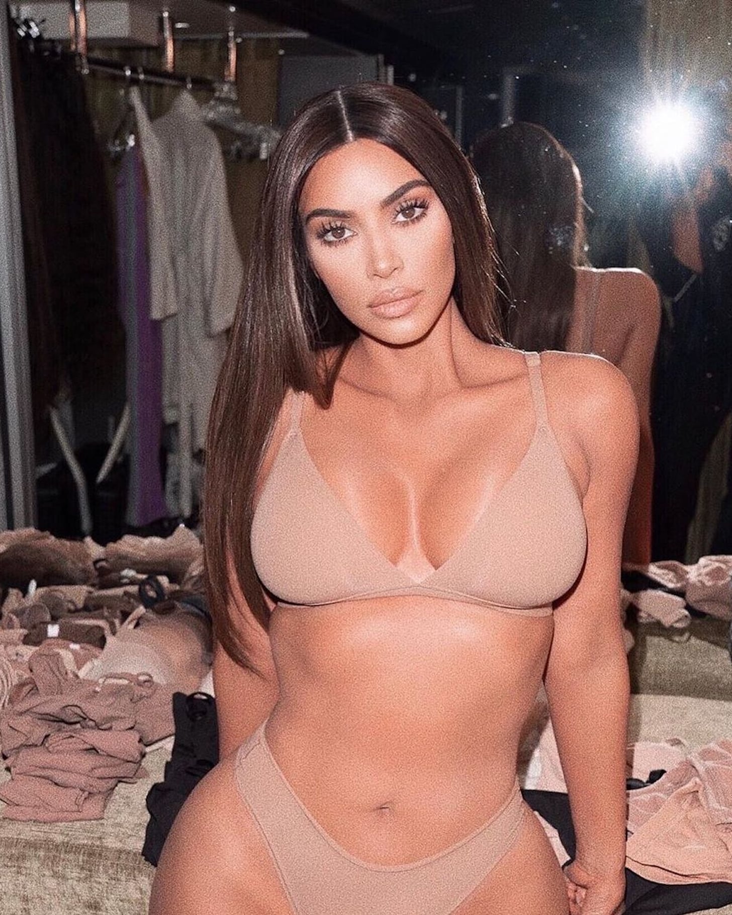 SKIMS, Designed with ultra-soft buttery fabric that molds to your body,  @KimKardashian wears the Fits Everybody Scoop Neck Bra and Thong in Clay