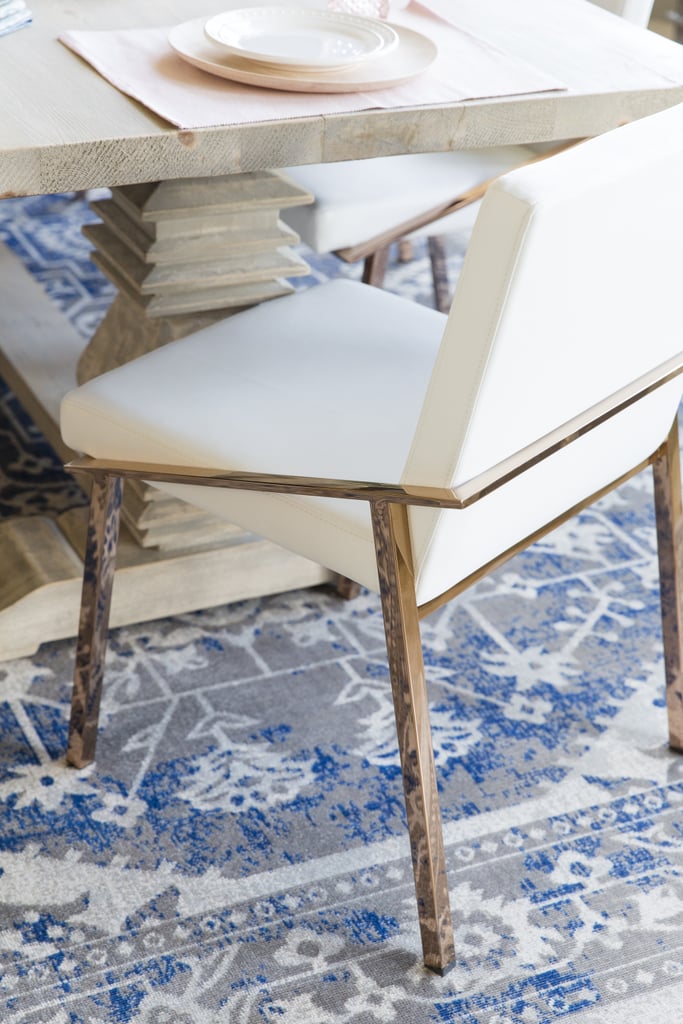 The dining chairs are Christine's favorite piece from the makeover. "I really wanted white chairs, but we had linen ones previously and my kids spilled so much on them that they got ruined fast. These are amazing! We've already spilt juice, spaghetti, syrup — the works — and it wipes up and cleans so easily because it's leather!"