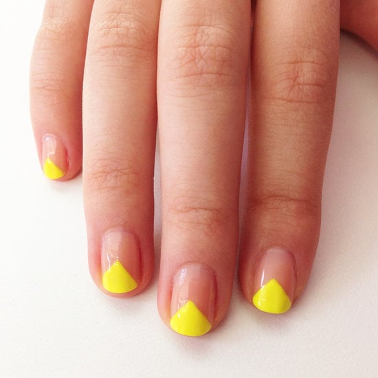 Take the edge of your favorite neon polish up a few notches with this easy-to-DIY V-shaped manicure idea.
