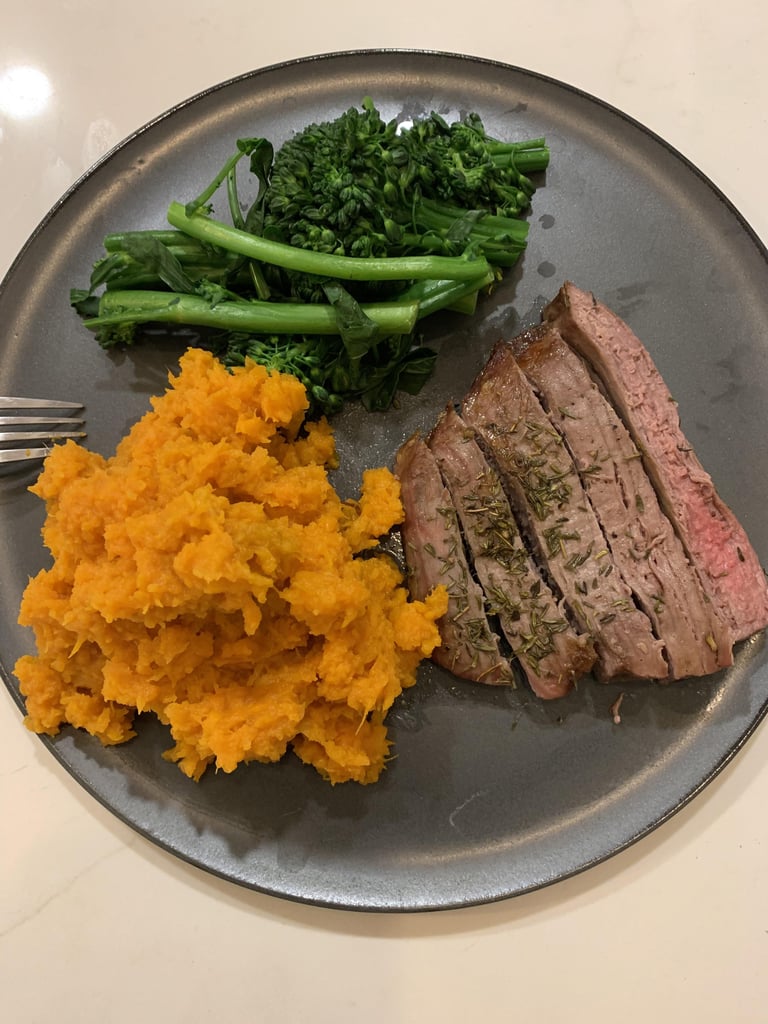 Dinner (around 6:30 p.m.): 5 ounces of flank steak, one large sweet potato, and veggies.
Snack (before bed at 9 p.m.): 100 grams of Greek yogurt, berries, and 30 grams of granola.