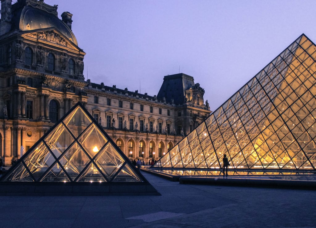 While there are countless areas to fully embrace the time of dusk, one place in particular that's extra captivating is the Louvre. And the best part? Once the curtain is drawn on the day, this museum immediately lights up the sky. Witnessing just one glimpse here at night will justify why this city is nicknamed "The City of Lights."