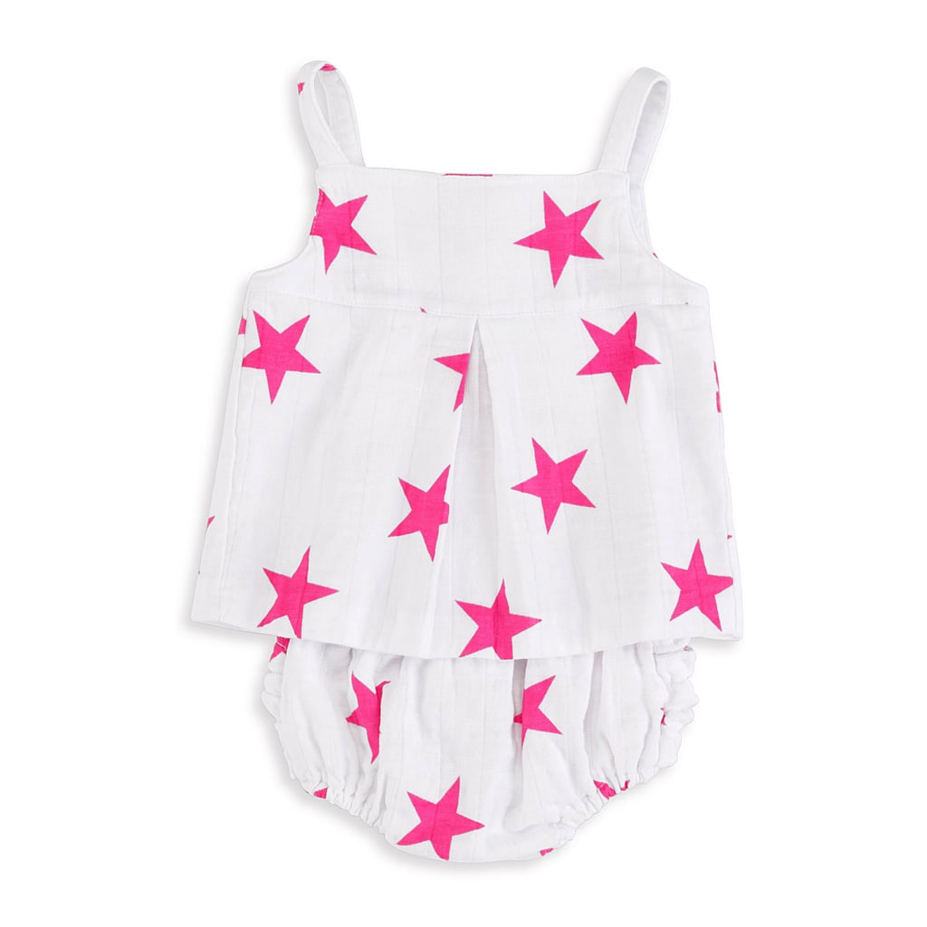 Aden + Anais Shocking Pink Star Smock Top ($20), Aden + Anais Shocking Pink Star Ruffle Bloomer ($15)