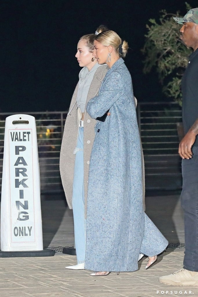 Hailey Baldwin Wearing Her Bieber Necklace With a Blue Coat