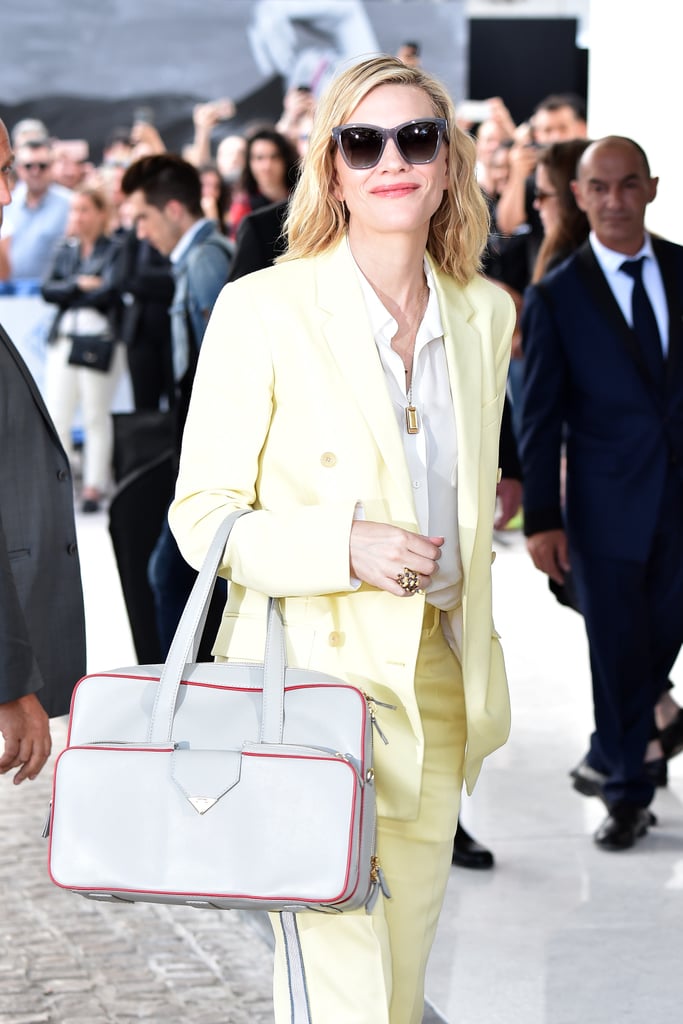 Cate's lemon yellow suit is Calvin Klein. Her stylist Elizabeth Stewart and Tyler Ellis designed the bag!