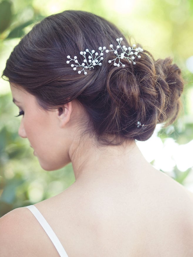 Inspired by baby's breath, this wire hairpin ($65) is made with Japanese pearls. The soft and delicate look works with all bridal hairstyles.