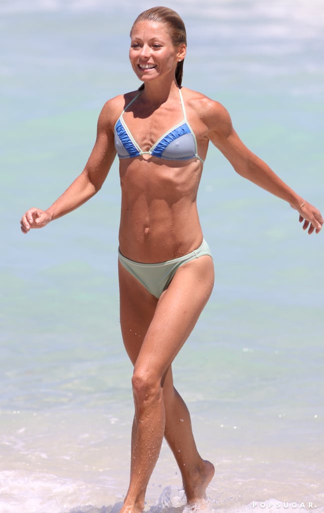Kelly's flat tummy was on display during a day in the ocean in Miami back in May 2009.