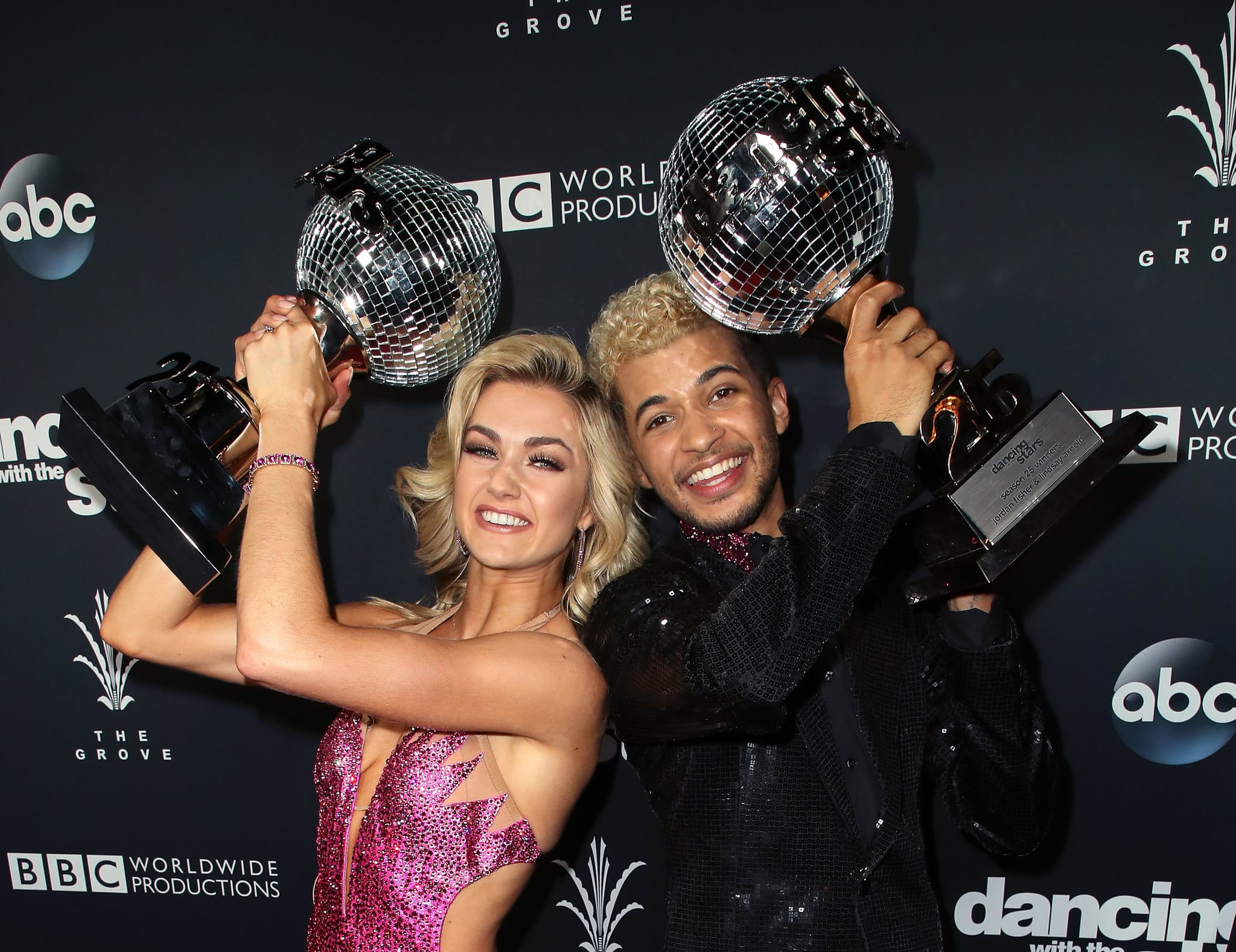 LOS ANGELES, CA - NOVEMBER 21:  Singer Jordan Fisher (R) and dancer Lindsay Arnold pose at 