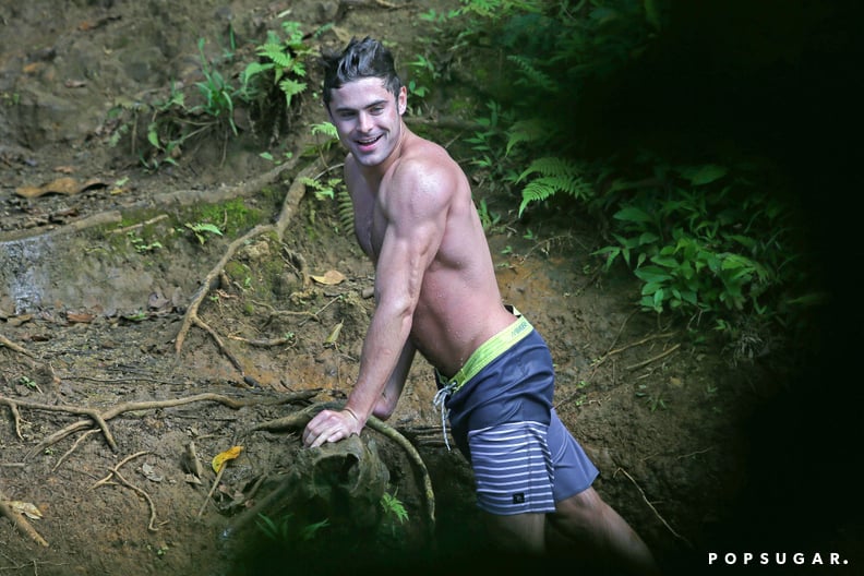 Shirtless Zac Efron On A Rope Swing Popsugar Celebrity