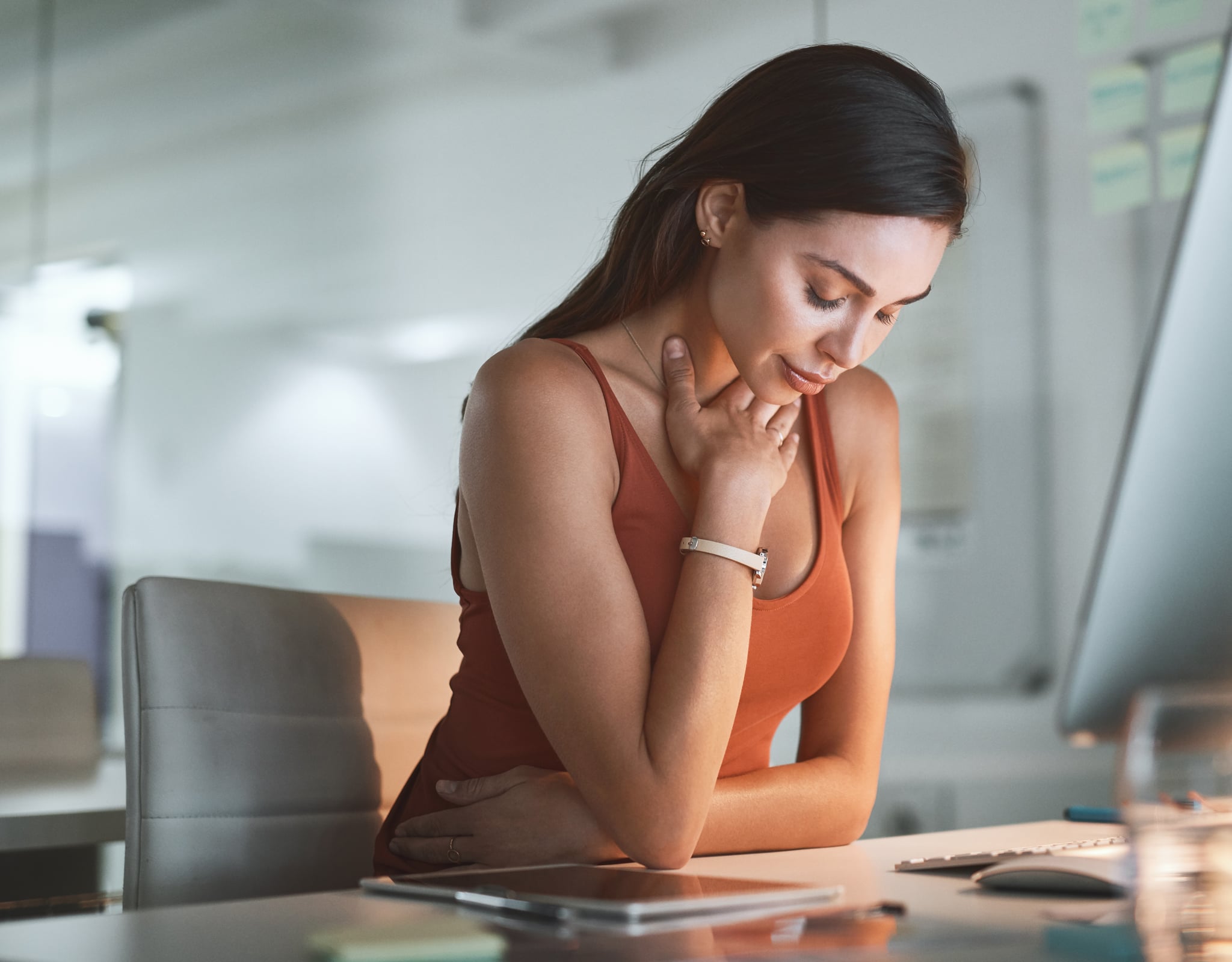 Cropped shot of a businesswoman sitting at her desk