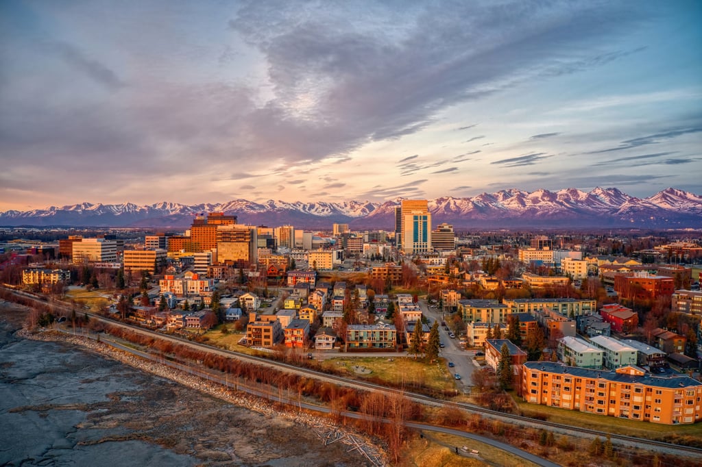 Anchorage, Alaska
Alaska may seem far away, but it's less than a four-hour direct United flight from Seattle, five hours from Denver or San Francisco, or six hours from Chicago. And with daylight all summer long, plus an airport close to the center of town, even a short vacation in Anchorage will be well spent. Known as Alaska's biggest village, the city is located in the homelands of the Dena'ina Athabascan people and the Native Village of Eklutna. Anchorage is the perfect place to learn more about Indigenous culture, with about 12 percent of residents identifying as Native. Visit the Alaska Native Heritage Center to see performances, view Native American regalia, artifacts, art, and more, or drop into the Anchorage Museum to see contemporary work by Indigenous artists and learn more about Alaska's history. Every spring, the Native Youth Olympics takes place here and in October, the city celebrates Quyana Alaska, a cultural celebration to continue culture and dances for future generations. 
Solvang, California 
If you're dreaming of a vacation full of family pics in front of windmills and historic European homes, look no further than this Southern California town, a short drive from the Los Angeles airport. Known as the Danish Capital of America, Solvang's bustling Copenhagen Drive offers walking plenty of stops for shopping, wine tasting, enjoying Danish pastries, and more, all housed within charming Danish Village-style architecture. Solvang is lovely to visit year-round, but we especially recommend mid-September, which brings the annual Danish Days, a weekend full of events — and food — celebrating Danish culture. With your United Quest℠ Card, you'll earn 2x miles per $1 spent on dining, so you can freely taste your way around the city.
Little Village, Chicago, Illinois
Weather-wise, Chicago may not seem like a match for Mexico, but the city's Little Village (aka La Villita) neighborhood is dubbed the "Mexico of the Midwest" and is full of Mexican culture. Over 75 percent of residents here are Mexican and the walkable area is full of family-owned businesses like bakeries, restaurants, shops, art spaces, and more.  Be sure to pass through the terracotta arch over 26th Street and snap some photos in front of the colorful murals. At night, 21+ visitors can pop into an institution known as the oldest Latino drag bar in the nation. The best time to visit might be in mid-September, for the annual Mexican Independence Day Parade.