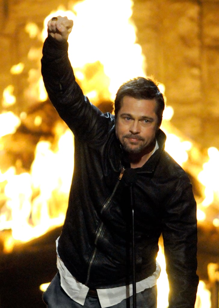 Brad Pitt threw his fist in the air during the Guys Choice Awards in 2009.
