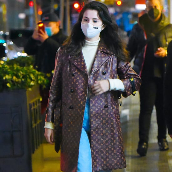 Selena Gomez Wearing Logo-Covered Louis Vuitton Coat in NYC