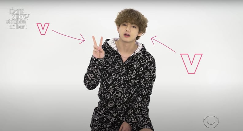 V From BTS Doing the "V" or "Peace" Hand Gesture
