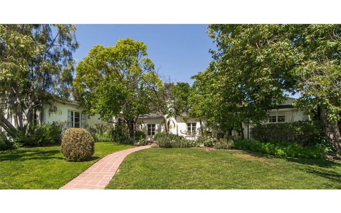 Perfect for a celebrity escaping the paparazzi, the old home is hidden behind gates and sits on half an acre of land in the Hollywood Hills.