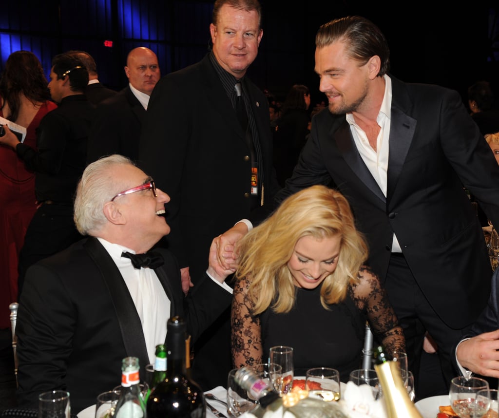 Leonardo DiCaprio shook hands with Martin Scorsese while Margot Robbie laughed at the Critics' Choice Awards.