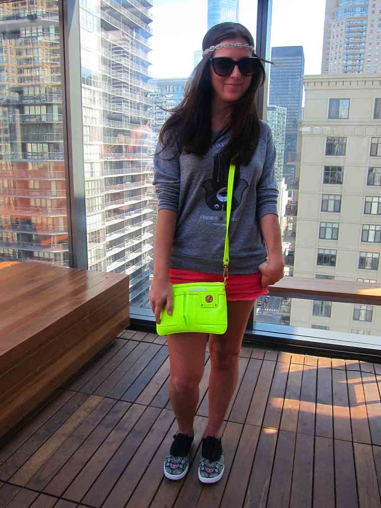 At a MAC Lollapalooza rooftop party, Katie showed how much fun it is to wear festival merchandise. She paired her sweatshirt with a neon yellow Marc by Marc Jacobs bag and BucketFeet owl-print shoes.