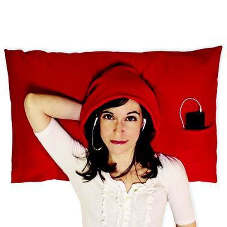 This hoodie pillowcase with headphone portals and a side pocket to