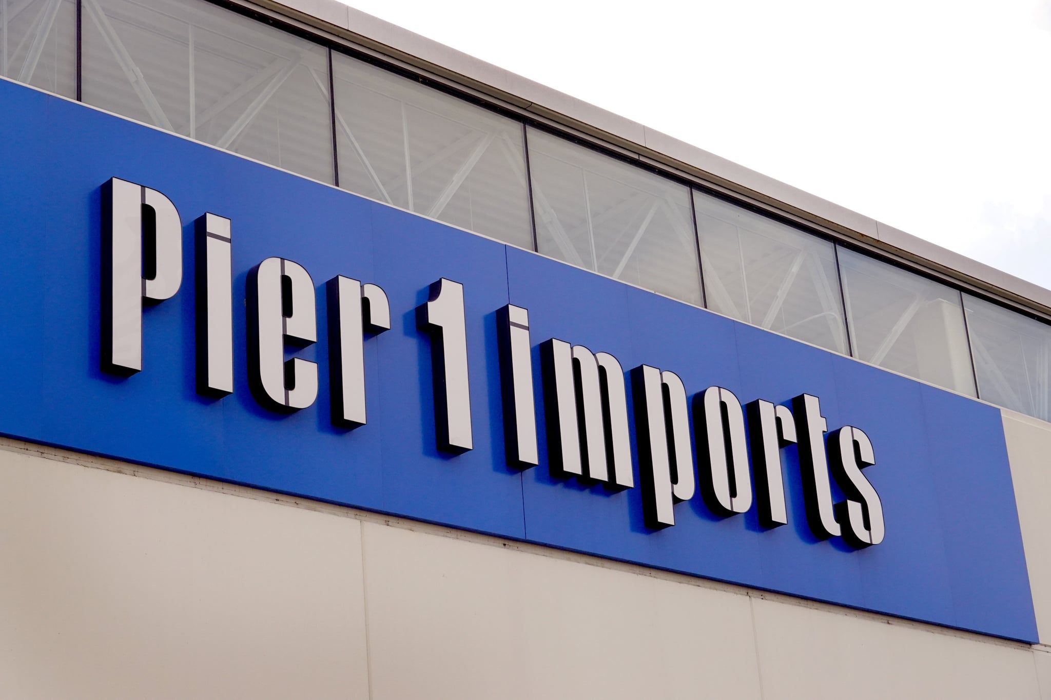 CHICAGO, ILLINOIS - FEBRUARY 18: A sign hangs above a Pier 1 imports store that is slated to close on February 18, 2020 in Chicago, Illinois. The struggling retailer announced today that it had filed for bankruptcy and was closing 450 stores.  (Photo by Scott Olson/Getty Images)