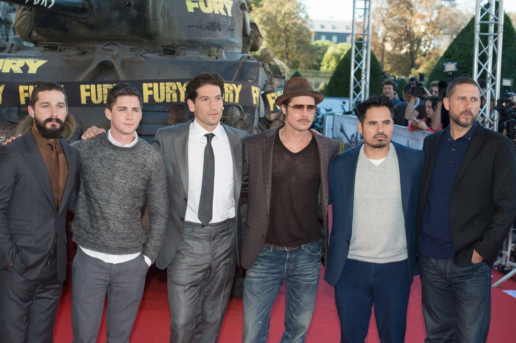 Brad walked the red carpet at the Paris premiere of Fury with his costars — Shia LaBeouf, Logan Lerman, Jon Bernthal, and Michael Peña — and their director, David Ayer.