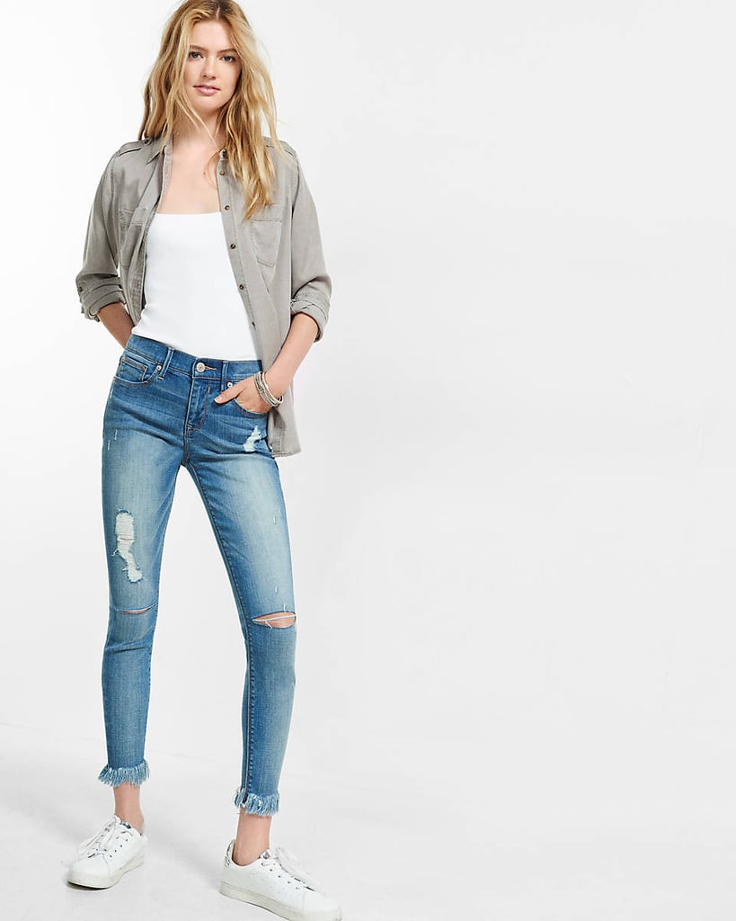 Express distressed mid rise frayed hem ankle jean legging ($79.90)