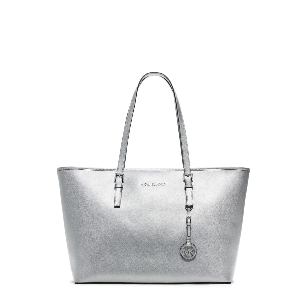 <product href="https://www.michaelkors.com/product/jet-set-travel-medium-metallic-saffiano-leather-tote/_/R-US_30T5MTVT2M?ecid=MKA_CommissionJunction_US">Michael Michael Kors Jet Set Travel Medium Metallic Leather Tote</product> ($157, originally $298)</p>