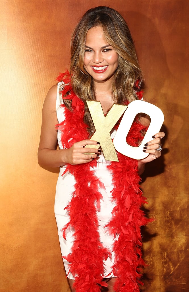 Chrissy Teigen got goofy for the camera while promoting her XOXO Fall campaign in NYC on Thursday.