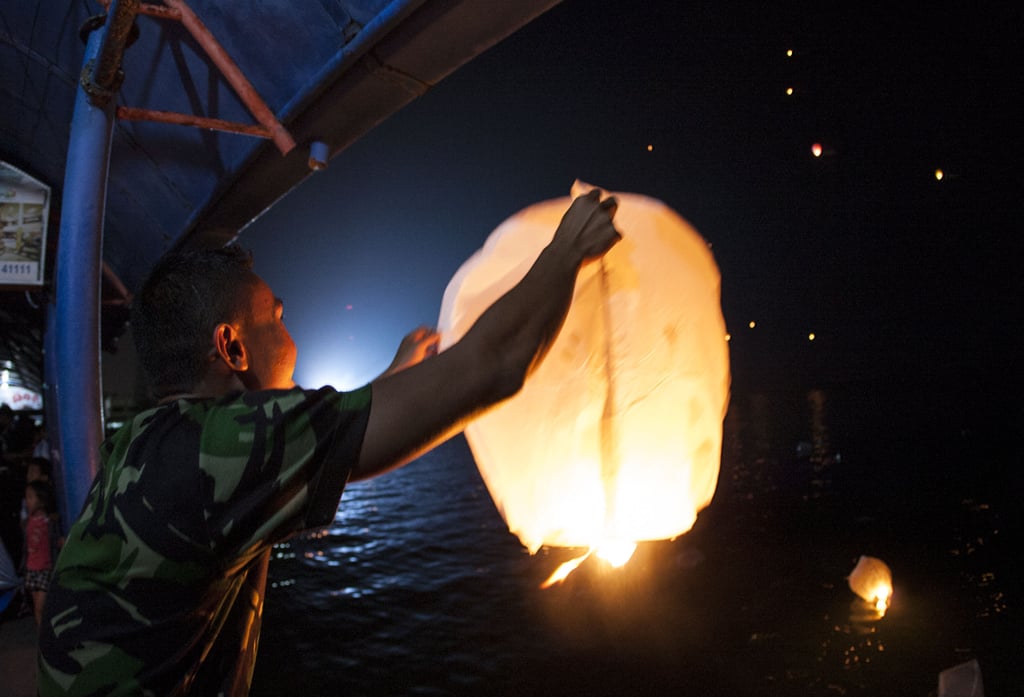 Lanterns were lit and released into the sky in Bintan Island, Indonesia, on New Year's Eve.