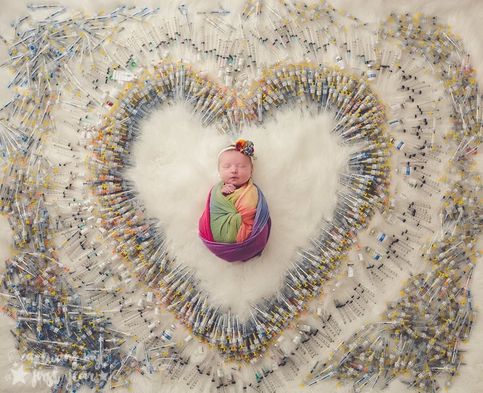 After trying to get pregnant for four long years via IVF, Patricia and Kimberly O'Neill, a couple from Arizona, finally welcomed a beautiful little girl, London, into the world via C-section on Aug. 3. To celebrate their beautiful baby girl and the long road they traveled to officially become parents, they hired photographer Samantha Packer of Packer Family Photography to capture their experience in an image — and it's no surprise it went completely viral when she shared it on Facebook. 
Samantha posted the mesmerizing photo of London surrounded by all 1,161 IVF needles Patricia used for her fertility treatments on Aug. 10 with the caption: "This is the first time I have been asked to do a photo like this! I was honored and wanted to create something special! Mom said, '4 years, 7 attempts, 3 miscarriages and 1,161 shots.'" Unsurprisingly, the image has already racked up 91,000 reactions and 66,000 shares. 

    Related:

            
            
                                    
                            

            1 Woman Documented Her IVF Treatment From Start to Finish With Photos, and We&apos;re Exhausted Just Looking at It
        
    
Now that London is two weeks old, Patricia and Kimberly couldn't imagine their lives without their new bundle of joy. 
"We feel so blessed to have her," 30-year-old Patricia told People. "She's calm at most times, and a little feisty when she's hungry. I don't have the words to express it, she's just so amazing." 
"Sometimes when you're at it alone, you need to know that someone's been able to get there, and they've had struggles, too."
But Patricia admits that after suffering two miscarriages in 2016 and a third one the following year, she was about ready to give up. "I was done. I was done poking and prodding myself. I was done with all the doctors visits. I was throwing in the towel," she explained. "My wife and my mom, they pushed me to do it."
And while there's no question that the pair's IVF journey was daunting, Patricia hopes that the image will help other couples who are struggling with the same infertility challenges. 
"It's a good representation of our journey," explained Patricia. "It's inspiring to hear other women sharing their stories on a topic that's kind of taboo. It's been great to see some women that are like, 'You're giving us hope to get through this' because you truly need that. She also added: "Sometimes when you're at it alone, you need to know that someone's been able to get there, and they've had struggles, too. You've gotta persevere through them."
As for how how Patricia and Kimberly reacted to the photo at fist? They understandably choked up. 
"It was amazing to see them all laid out. To look at them all and go, 'Man, I was able to do that. I was able to get through that,'" said Patricia. "My wife and I looked at them and we started tearing up."
Obviously, the photo resonated with hundreds of people. Scroll through to see some of the most heartwarming remarks and try to hold back the tears. 

    Related:

            
            
                                    
                            

            Mom on IVF Rainbow Baby Blessing: "Some Fight This Battle and Leave With No Bundle in Their Arms"
