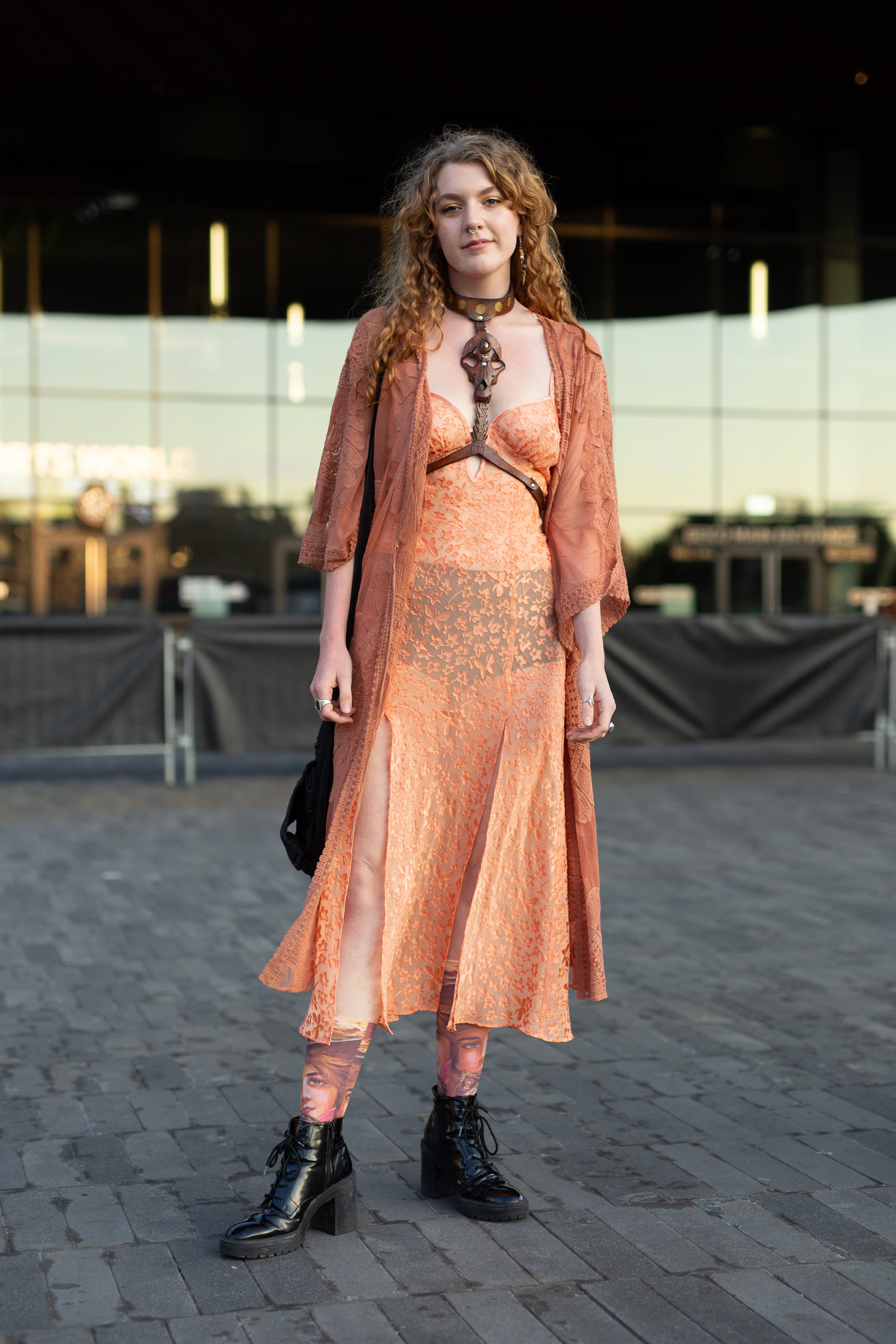 Styling an orange sheer dress with black underwear., This Is by Far the  Riskiest Outfit We've Seen at Fashion Week