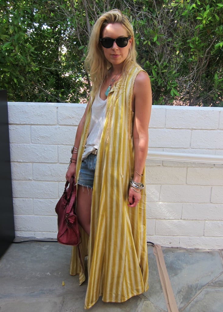 Behold bohemian glamour in the way of a vintage striped, sleeveless topper and a Balenciaga bag.
Source: Chi Diem Chau