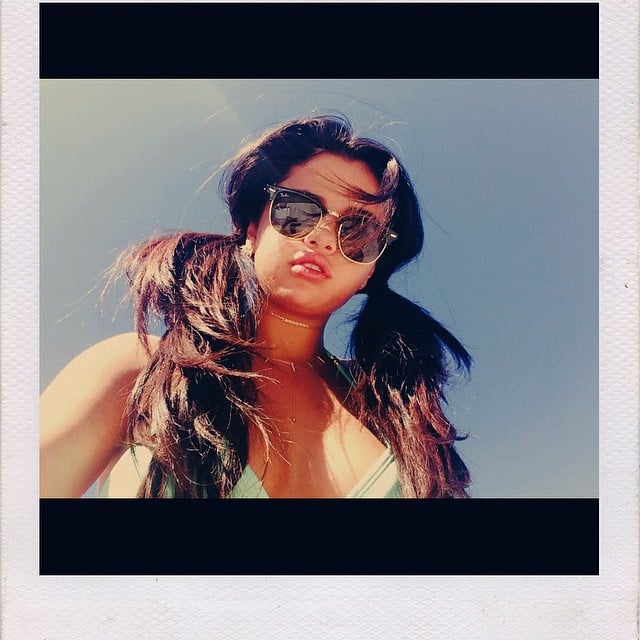 Selena Gomez soaked up some sun in pigtails and a bikini. 
Source: Instagram user selenagomez